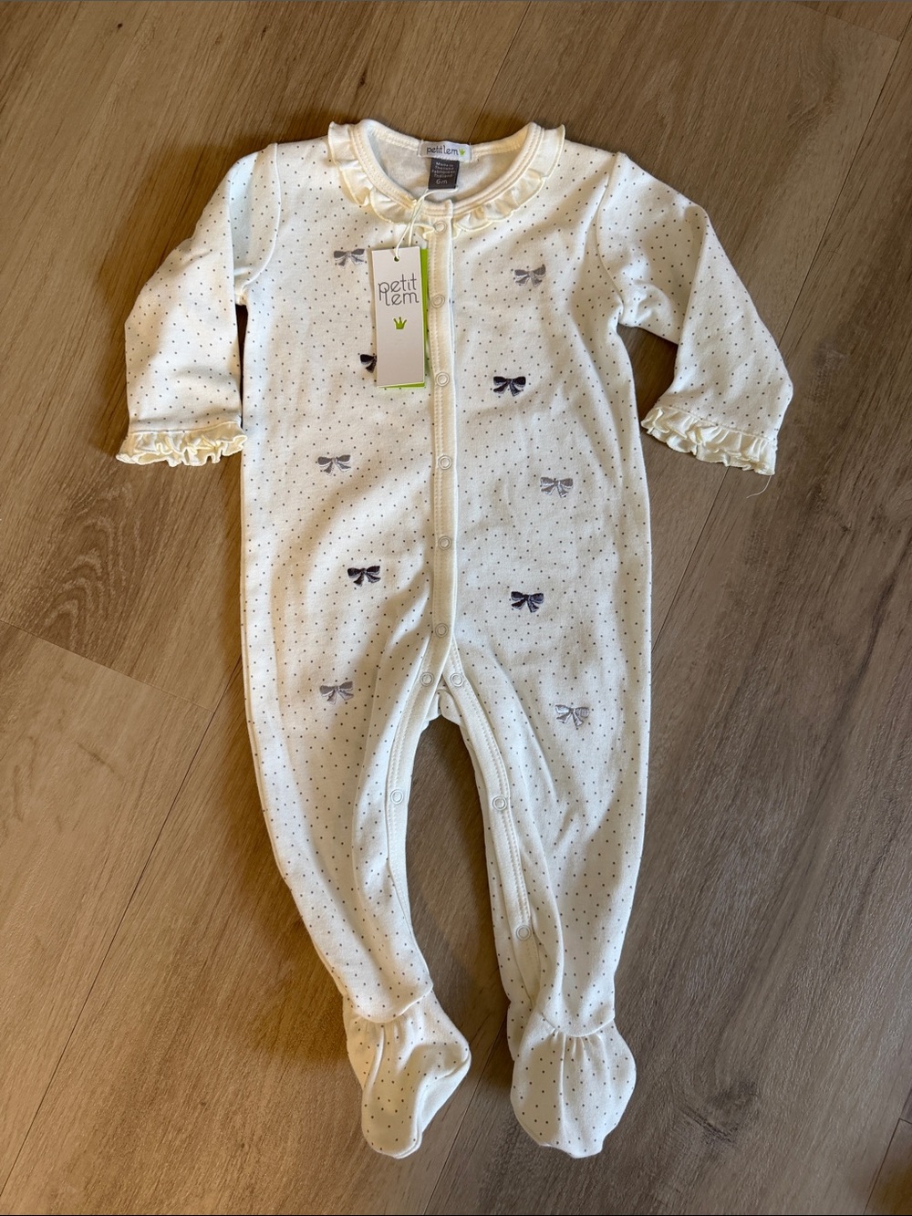 Petit Lem Cream Footed One-Piece with Navy Bow Print